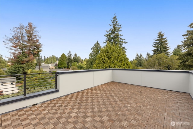 view of patio with a balcony