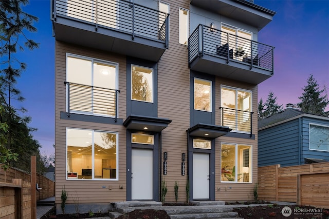 modern home with fence