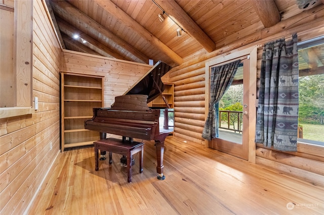 miscellaneous room with hardwood / wood-style floors, lofted ceiling with beams, wood ceiling, and track lighting