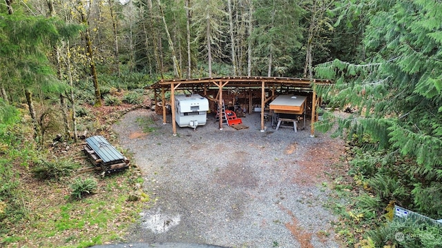 view of parking featuring a carport