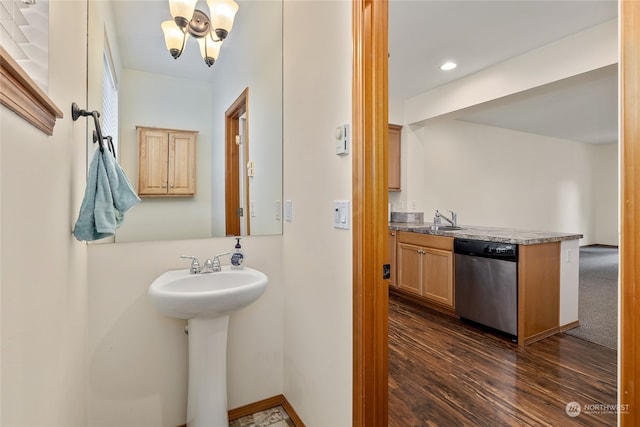 bathroom featuring hardwood / wood-style floors and sink