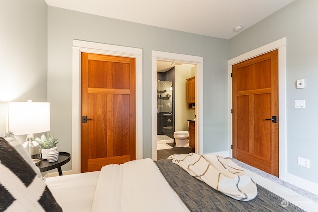 bedroom featuring connected bathroom