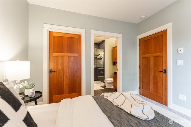 1000 High St Unit 101, Bellingham, WA 98225 - bedroom with baseboards and ensuite bathroom