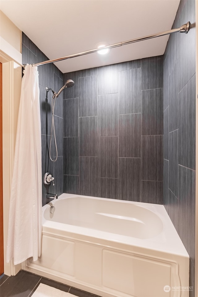 bathroom featuring tile patterned floors and shower / tub combo