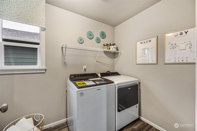 laundry area with washer and clothes dryer, laundry area, baseboards, and dark wood-style floors