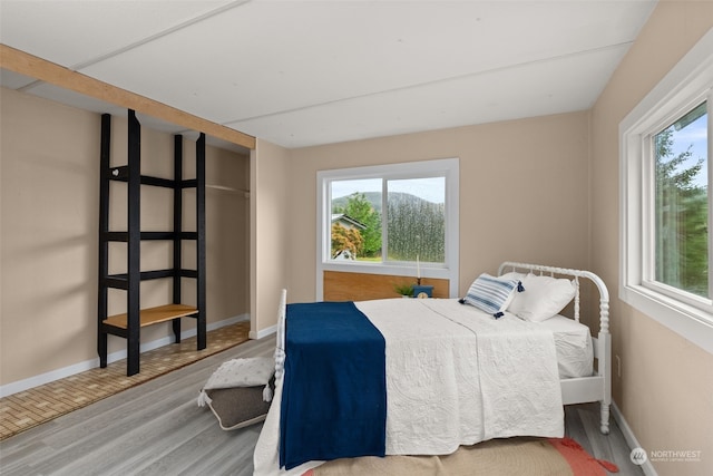 bedroom featuring hardwood / wood-style floors