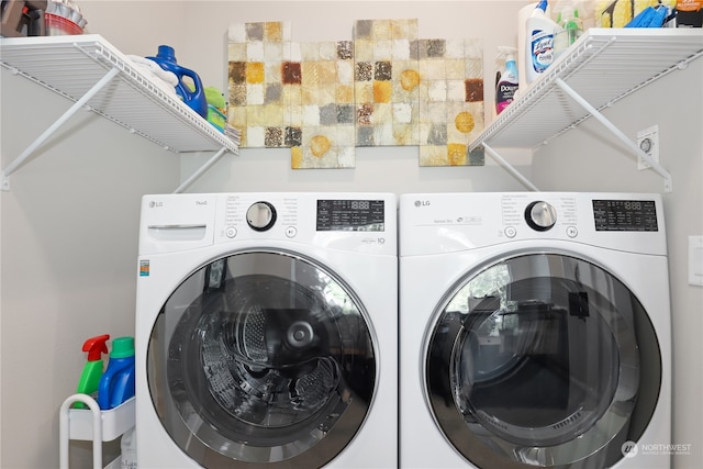 laundry room with separate washer and dryer