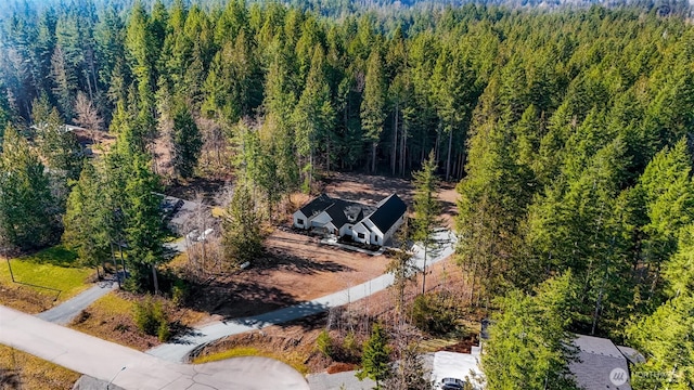 drone / aerial view with a forest view