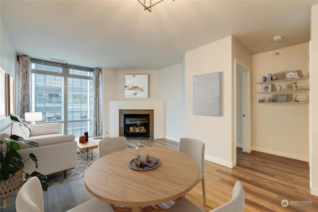 dining space featuring hardwood / wood-style floors