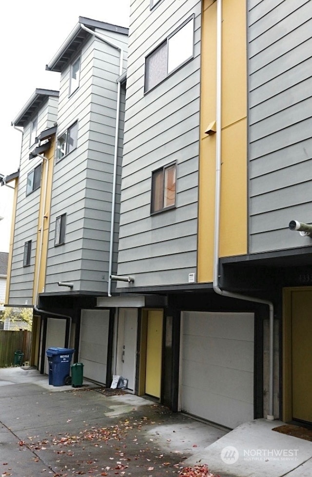 view of home's exterior with a garage