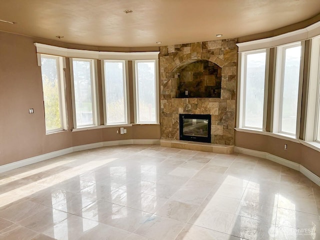 unfurnished living room featuring a fireplace