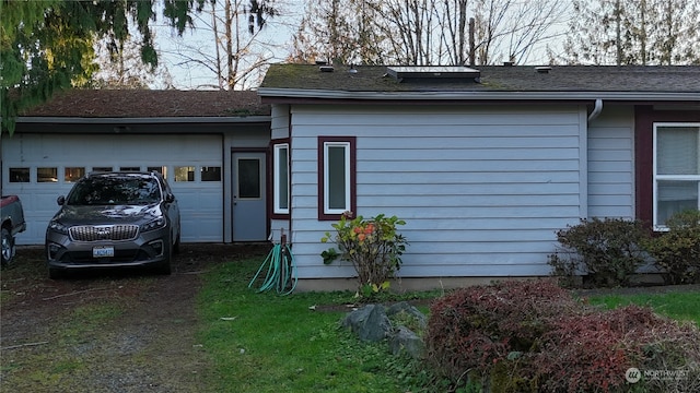 view of home's exterior featuring a garage