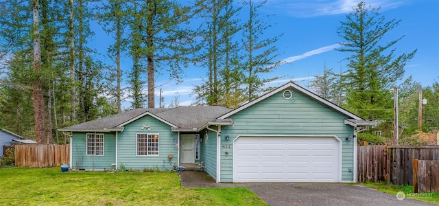 ranch-style home with a garage and a front lawn