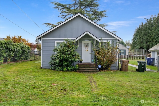 view of front of home featuring a front lawn