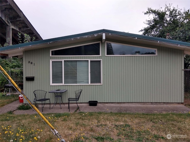 view of property exterior featuring a yard