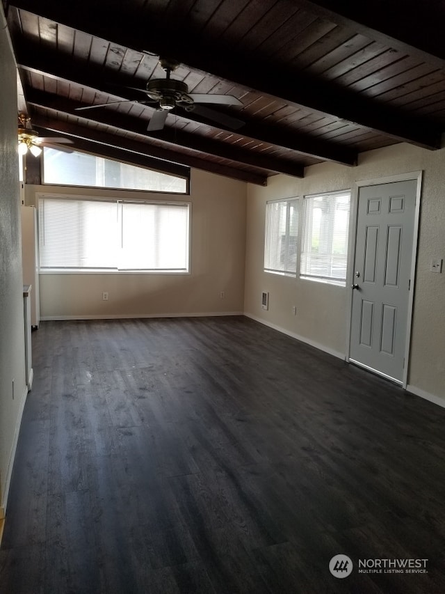 interior space featuring dark wood-type flooring, ceiling fan, wood ceiling, and vaulted ceiling with beams