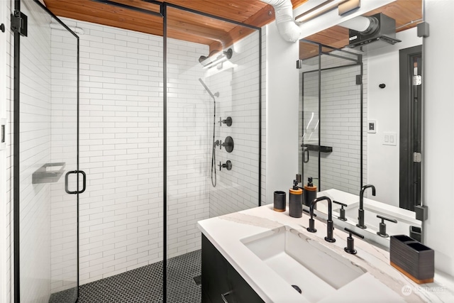 bathroom featuring vanity and walk in shower