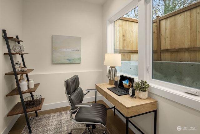 office area with hardwood / wood-style floors