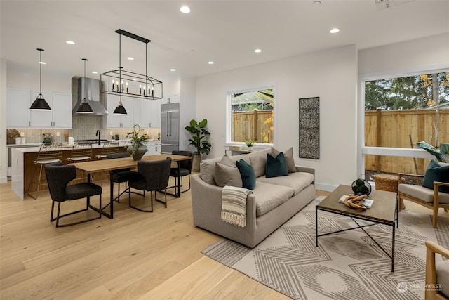 living room with light hardwood / wood-style flooring