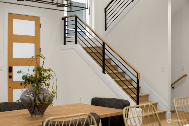 stairway with wood-type flooring