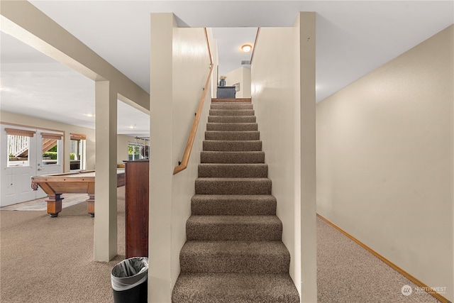 staircase featuring carpet floors and pool table