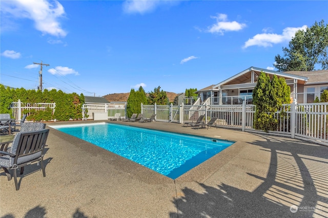 view of pool with a patio