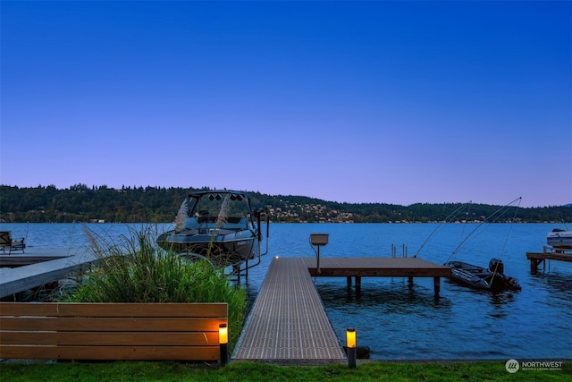 view of dock with a water view