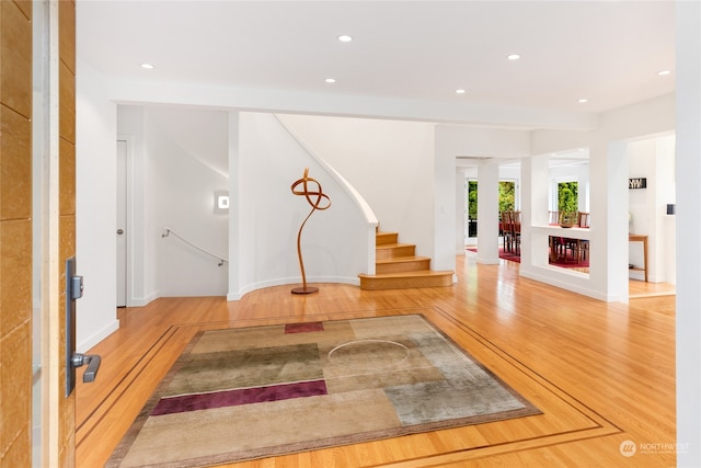 foyer entrance with light wood-type flooring