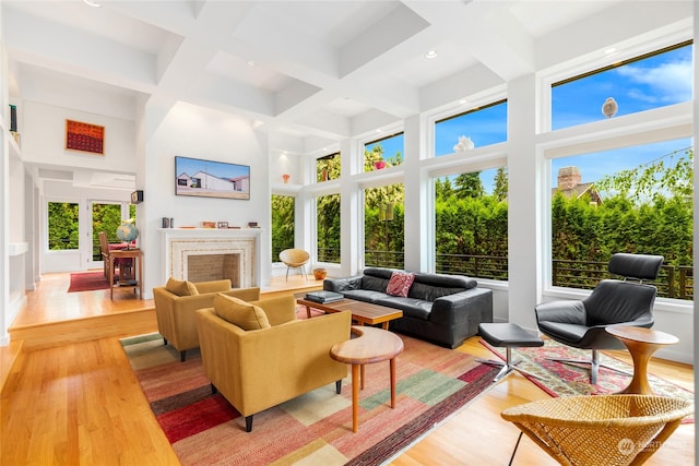 sunroom / solarium with beam ceiling and coffered ceiling