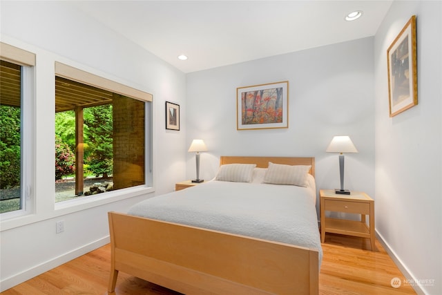 bedroom featuring light hardwood / wood-style floors