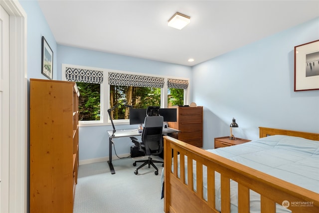 bedroom with light carpet