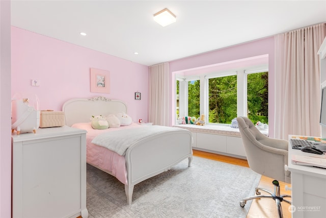 bedroom featuring light wood-type flooring