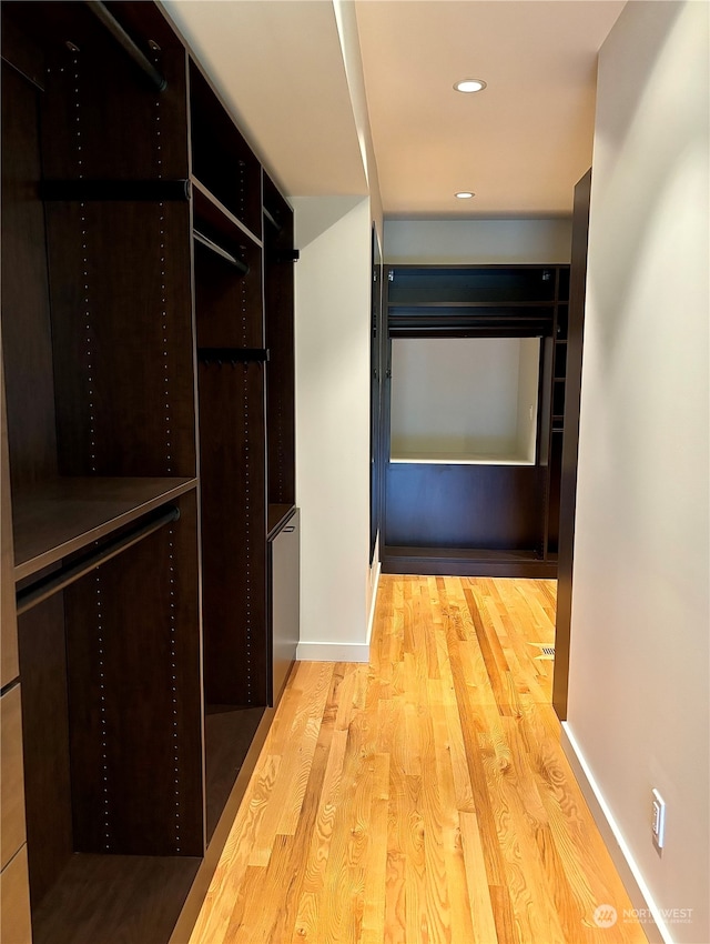 corridor featuring light wood-type flooring