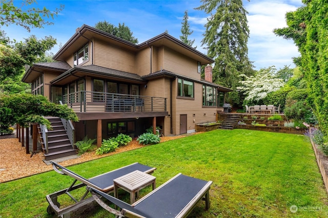 7842 NE 10th St, Medina, WA 98039 - back of property with a sunroom, stairs, and a yard