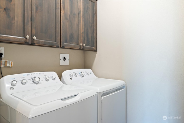 146 Zephyr Dr, Silverlake, WA 98645 - laundry room featuring washing machine and clothes dryer and cabinet space