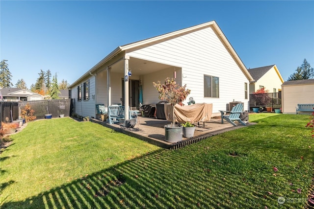 146 Zephyr Dr, Silverlake, WA 98645 - rear view of house featuring a fenced backyard and a patio area