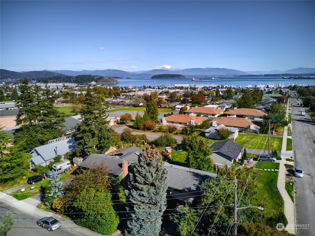 bird's eye view featuring a water and mountain view