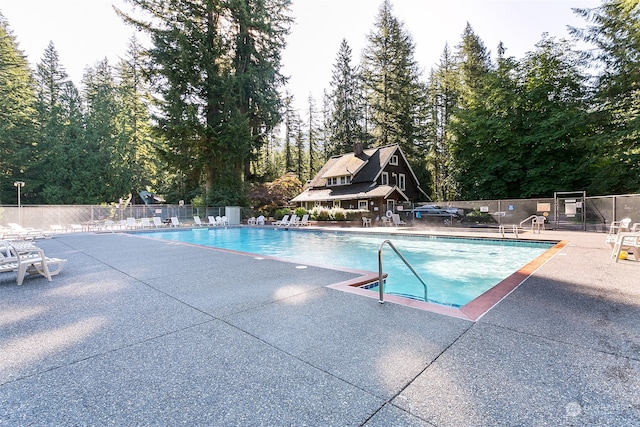 view of pool featuring a patio