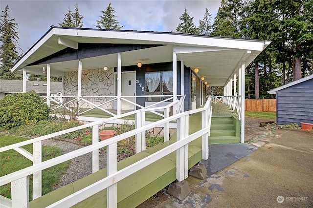 exterior space featuring covered porch