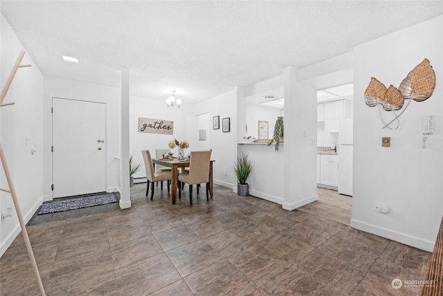 dining room featuring an inviting chandelier