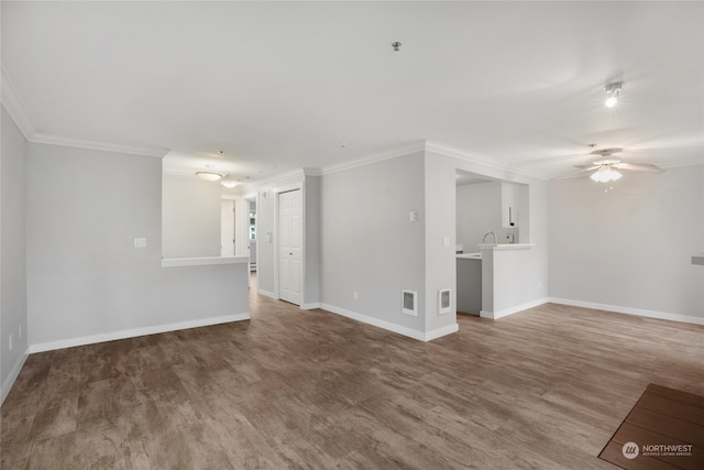 unfurnished living room featuring hardwood / wood-style floors, ceiling fan, and ornamental molding