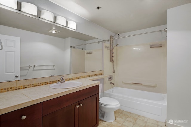 full bathroom featuring vanity, shower / bathtub combination, and toilet