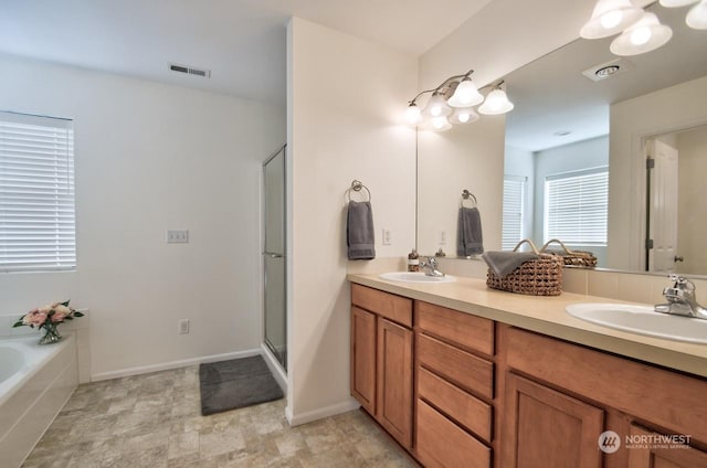 bathroom featuring vanity and plus walk in shower