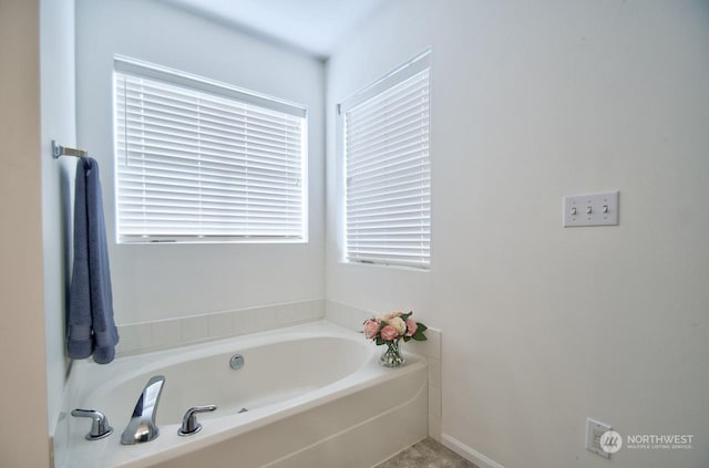 bathroom featuring a tub