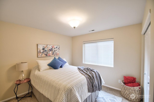 bedroom featuring carpet floors and a closet