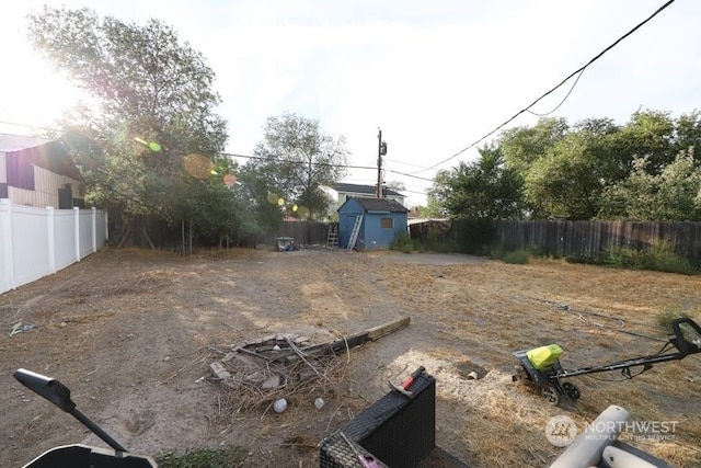 view of yard with a storage shed