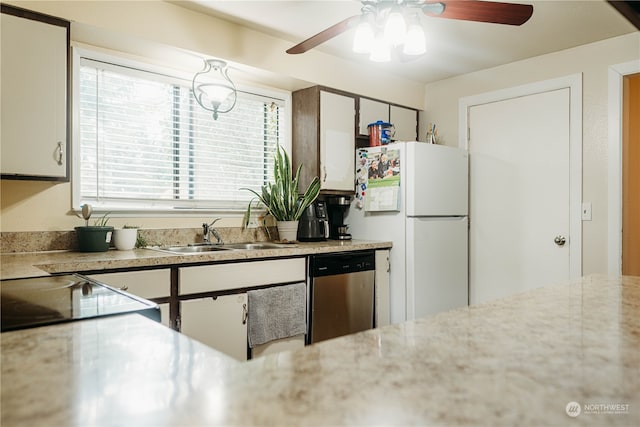 kitchen featuring stainless steel appliances, white cabinetry, ceiling fan, and sink