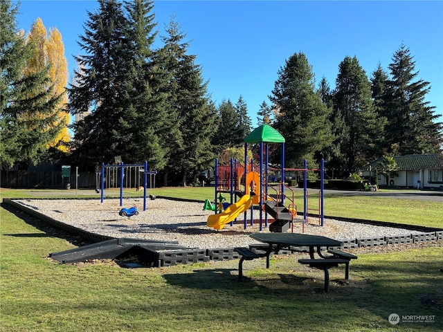 view of jungle gym featuring a yard