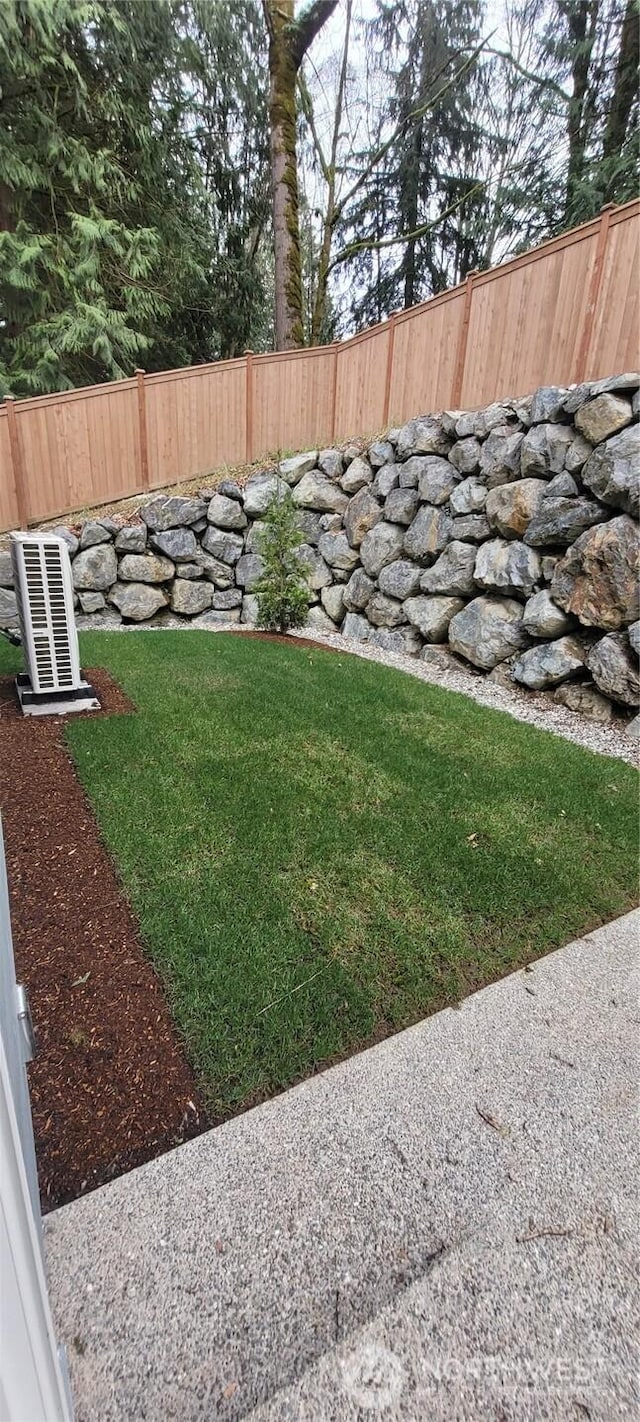 view of yard with fence