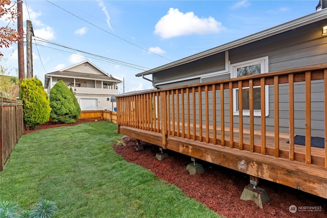 deck featuring a yard